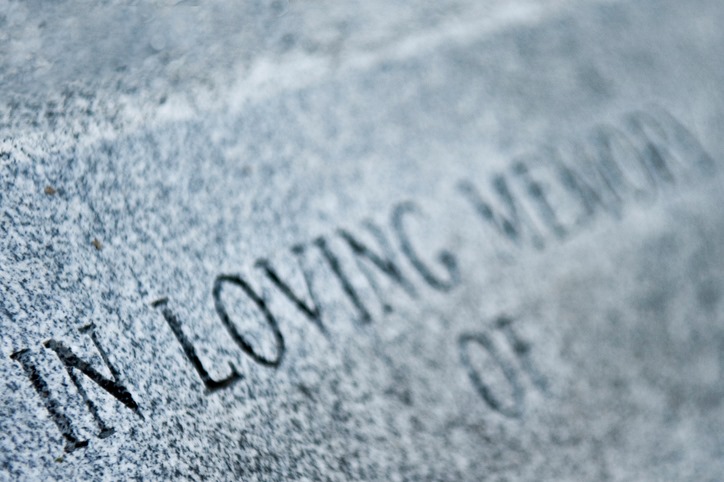 A photo of an inscription that says 'loving' on a memorial at Woodlawn Memorial Park in Guelph. Ontario.