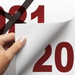 Woman Turning The Page From 2021 To 2022 | Year In Review