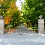 a view of woodlawn memorial park entrance on a sunny day