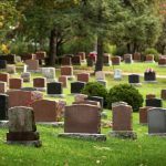 Woodlawn Memorial Park headstones on a spring day